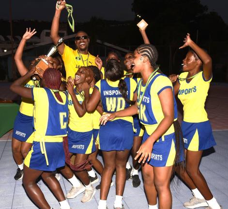 José Martí  High School celebrate their win over Gaynstead High School in the Insport Summer Challenge Cup Netball final at the Leila Robinson Netball Courts, National Stadium on Tuesday.