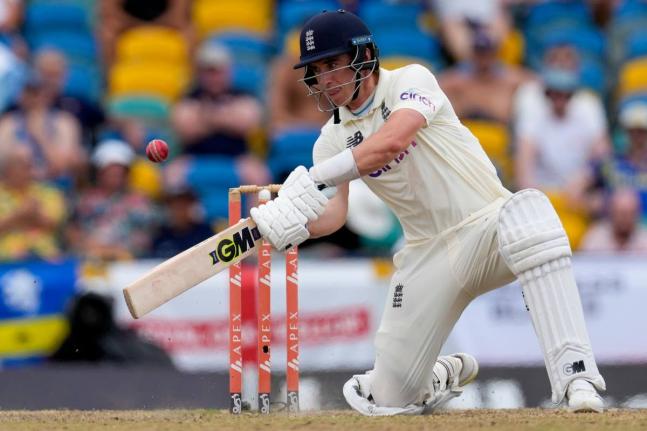 England’s Dan Lawrence bats against West Indies during day five of their second cricket Test match at the Kensington Oval in Bridgetown, Barbados, March 20, 2022.