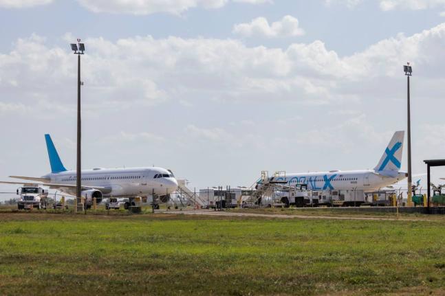 Planes used for deportation flights sit at the Valley International Airport, in Harlingen, Texas.