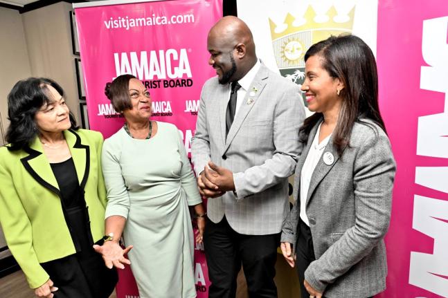 Nicola Madden-Greig (right), Chair of JAPEX 2026, chats with (from left) Camille Needham, Executive Director of the Jamaica Hotel and Tourist Association (JHTA); Vana Taylor, Chapter Chair of JHTA Ocho Rios; and O'Brian Heron, President of JHTA. The occasi