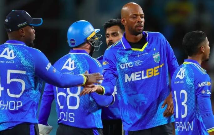 St Lucia captain Roston Chase celebrates with teammates after victory over the Antigua & Barbuda Falcons in the Republic Bank Caribbean Premier League on Sunday.