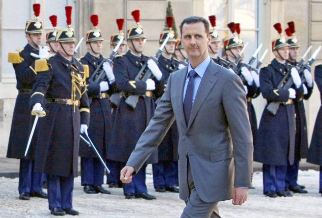Syria President Bashar al-Assad arrives at the Elysee Palace in Paris on December 9, 2010.