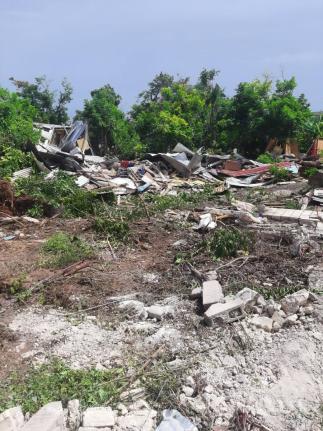 Houses in ruin after the demolition exercise in Cooper’s Pen, Trelawny, on Tuesday.