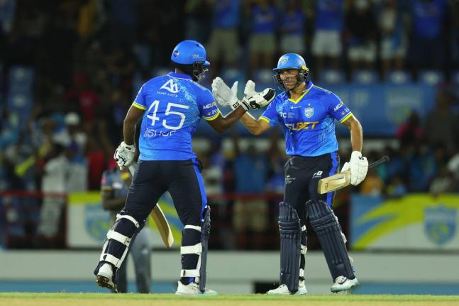 
Joshua Bishop (left) and Shadley van Schalkwyk of St Lucia Kings celebrate victory during the Republic Bank Caribbean Premier League T20 match against the Antigua and Barbuda Falcons in Gros Islet, St Lucia, on Friday night. 