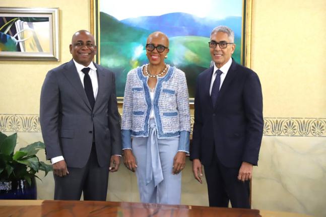 From left: Newly appointed Bank of Jamaica Governor, Dr Brian Langrin; Fayval Williams, Minister of Finance and the Public Service; and outgoing BOJ Governor Richard Byles. – Contributed photo
