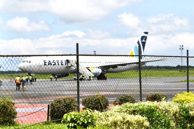 A plane carrying deportees from the United States arrives at the Roberts International Airport outside of Monrovia, Liberia, on Thursday. - AP photo