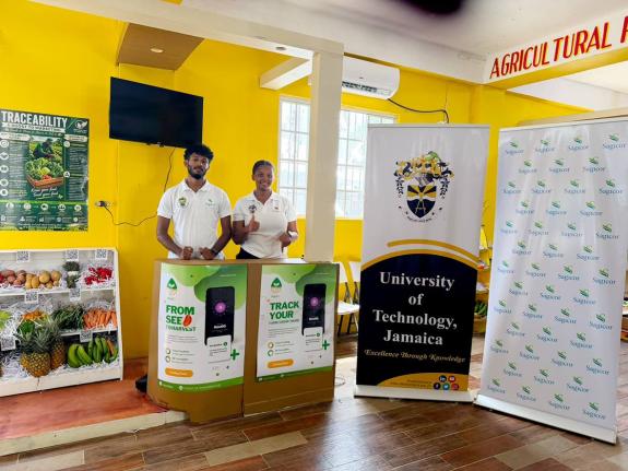 Students Dimetri Lee (left) and Serena Morris of UTech, Jamaica’s Sagicor Innovation Lab, showcase the RootIQ platform at the annual Denbigh Agricultural, Industrial and Food Show.