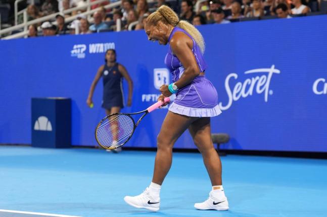 AP 
Serena Williams, of the United States, reacts to a winning point during a women’s doubles match against Marta Kostyuk, of Ukraine, and Peyton Stearns, of the United States, at the Cincinnati Open tennis tournament, on Monday, August 17, in Mason, Ohi