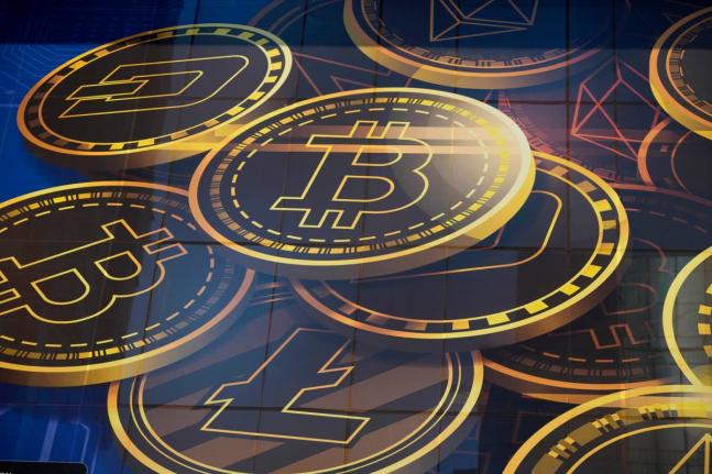 An advertisement for the cryptocurrency bitcoin is displayed on a building in Hong Kong in November 2021.  AP