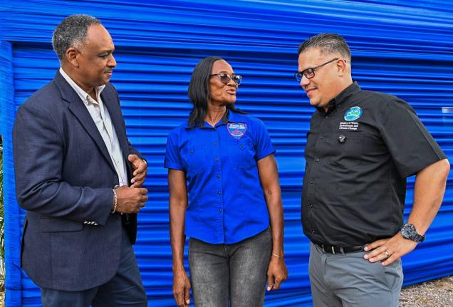 Minister of Water, Environment and Climate Change, Matthew Samuda (right), in conversation with Principal of the Bunkers Hill Primary and Infant School in Clarendon, Nathalia Lewis (centre), while Chairman of the Rural Water Supply Limited, Omar Sweeney, l