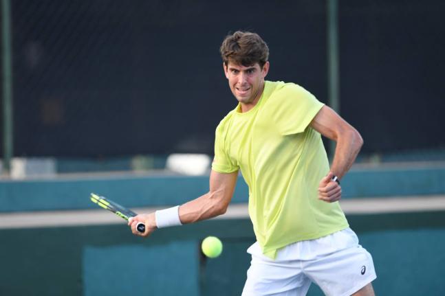 Blaise Bicknell prepares a forearm return during a Kingston Open tennis match on August 18 at Liguanea Club in New Kingston.