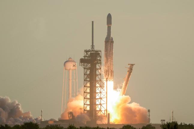 A SpaceX Falcon Heavy rocket with the space observatory Roman Telescope lifts off from launch complex 39A at the Kennedy Space Center in Cape Canaveral, Florida.