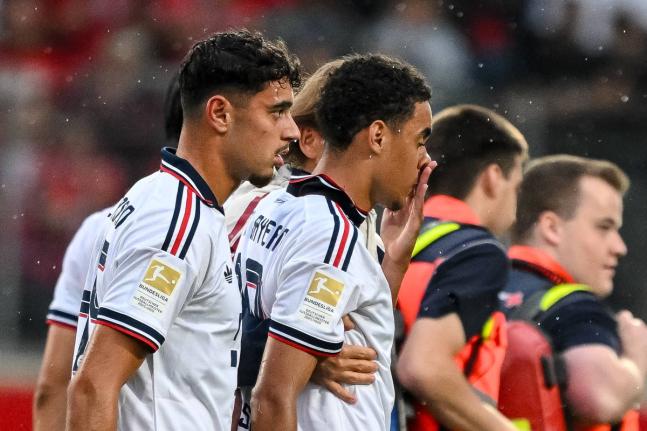 Bayern’s Jamal Musiala  (second left), leaves the field during a friendly football  match between FC Heidenheim and FC Bayern Munich in Heidenheim, Germany, Tuesday, August 18, 2026.
