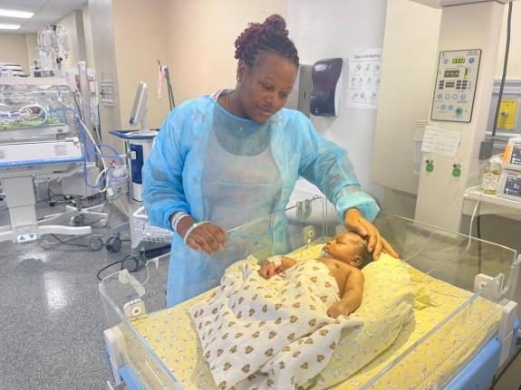 
Vachel Harwood looks at her sick baby, Kyrique Buchanan, inside the nursery at Victoria Jubliee Hospital in Kingston on Friday. Kyrique has been diagnosed with hypoplastic left heart syndrome, a congenital heart defect.