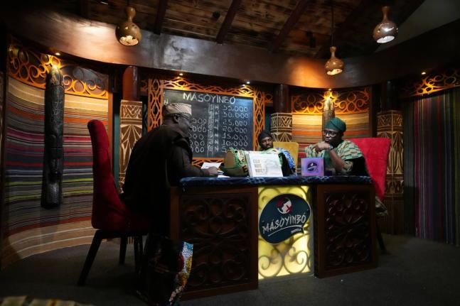 A contestant competes on a game show called Masoyinbo, which translates to ‘Do not speak English,’ in Lagos, Nigeria.