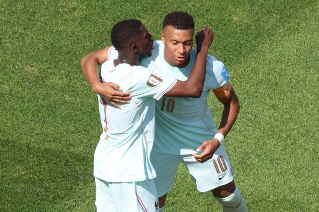France’s Kylian Mbappe (right) and Ousmane Dembele celebrate after scoring during the World Cup Group I football match against Norway in Foxborough, Massechusetts, near Boston on Friday, June 26.