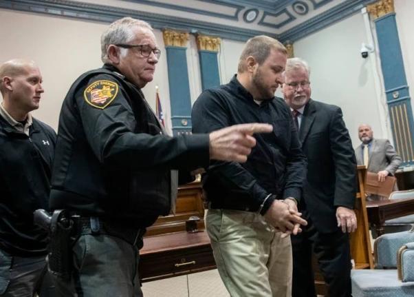 Jeriah Mast, a former missionary for Christian Aid Ministries, is taken into custody after his sentencing at Holmes County Courthouse in Millersburg, Ohio, in November 2019.