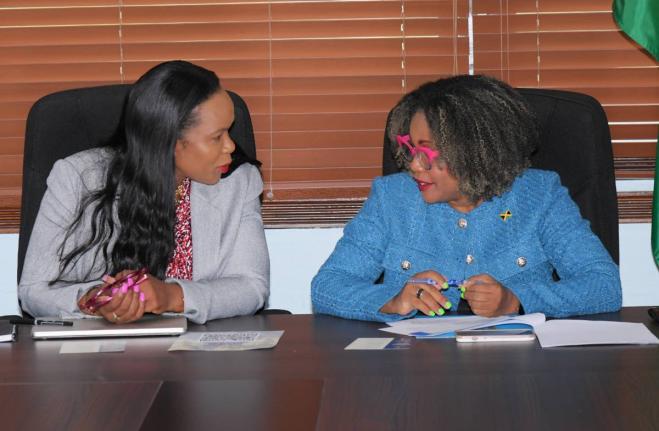 Senator Dr Dana Morris Dixon (right), minister of education, skills, youth and information; and Dr Kasan Troupe, permanent secretary in the ministry.