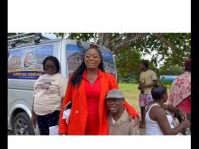 PNP candidate for St James Southern Nekeisha Burchell sharing a moment with her father Pastor Egbert Burchell on election day.