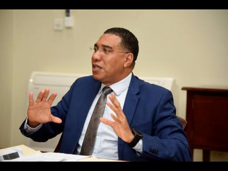  Prime Minister of Jamaica Andrew Holness speaking yesterday at a Zoom meeting with members of the Private Sector Organisation of Jamaica and the Jamaica Manufacturers and Exporters’ Association, along with other stakeholders to discuss the way forward i