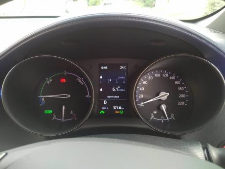 The power gauge on the left is the best method of coaxing the CH-R into its most fuel efficient moves.