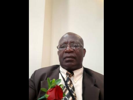 Dr Henroy Scarlett.