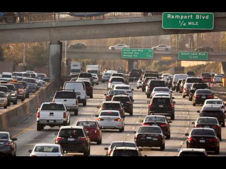 In this December 12, 2018 photo, traffic moves along the Hollywood Freeway in Los Angeles.