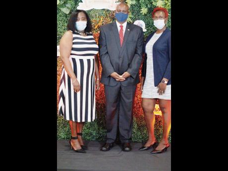 Kandasi Walton-Levermore, executive director of Jamaica Aids Support for Life (JASL), along with Jason Fraser, USAID/Jamaica country representative, and Dr Nicola Skyers, senior medical officer, Ministry of Health and Wellness, during the JASL’s 30th ann
