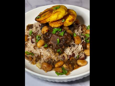It doesn’t get more Jamaican than rice and peas, oxtail and beans, and fried plantains.
