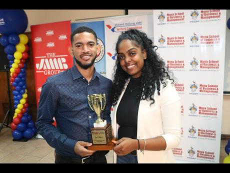 Credit: Contributed The third-prize winners in the Vincent HoSang UWI Venture Competition, Stuart Payne (left) and Cereta McDougall.