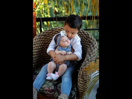 Credit: Azi.Photography Britney Williams and Nikolas Silvera’s children, Storm and baby Sadie.