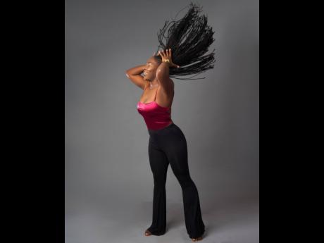 Credit: Contributed The recording artiste is settling into life in the Grand Cayman, and even finding spaces to record.