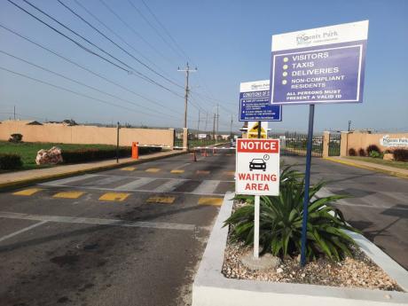 Credit: Corey Robinson The gated Phoenix Park Village housing scheme in St Catherine