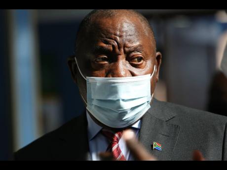 Credit: AP South African President Cyril Ramaphosa.