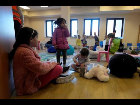 Credit: AP
Children who fled the war in Ukraine play at a sport hall turned refugee centre in Warsaw, Poland.