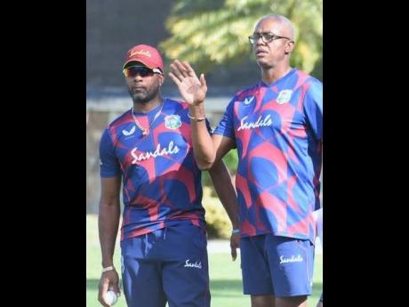 
West Indies Women’s head coach Courtney Walsh (right) and assistant coach Corey Collymore.