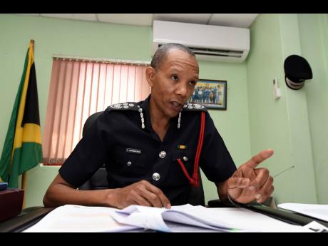 Credit: Ian Allen/Photographer Stewart Beckford, commissioner of the Jamaica Fire Brigade, discusses plans to boost the capacity of firefighters to respond to emergencies.