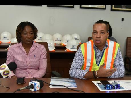 Valrie Campbell (left), director of Terminal Operations, and Dwain Powell, vice-president and port community system operator at the Port Authority of Jamaica speak about the Kingston Wharves and its operations to members of the port and shipping officials 