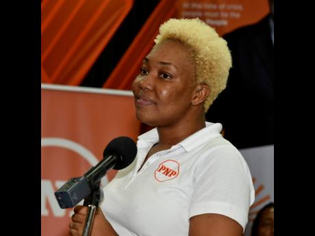 Peta-Gay Ferguson, prospective candidate for the People’s National Party in the Papine division, looks on pensively during a party divisional conference on Saturday.