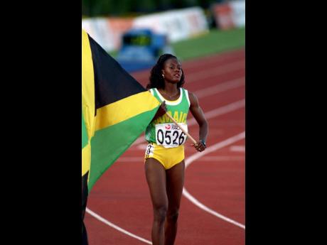 Credit: Track legend Merlene Ottey flew the black, green and gold with pride.