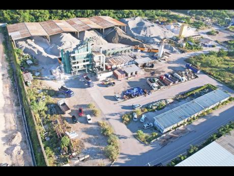 Credit: Ricardo Makyn/Chief Photo Editor
Aerial view of the China Harbour Engineering Company property located at the industrial complex off the Mandela Highway in St Andrew, where two security guards were killed on Sunday, December 11.