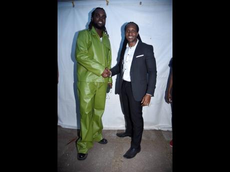 Credit: Nicholas Nunes/Photographer State Minister in the Ministry of Culture, Gender, Entertainment and Sport Alando Terrelonge gives the star of the night, Yaksta, more encouraging words backstage.