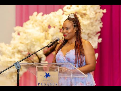 Above: Assistant Lifestyle and Online Editor, Debra Edwards, a key member of the ‘Flair’ team, which organises The Distinguished, gives her greeting to an attentive audience.