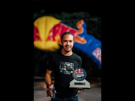 Last year’s Winner Nicolas Barnes poses for a photograph at the Red Bull Car Park Drift in Montego Bay, Jamaica on October 1, 2022. 