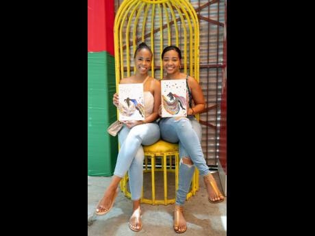 Besties that paint together, stay together. Or at least that’s what Krystel Robinson-Brown (left) and Yanique Mitchell say.  