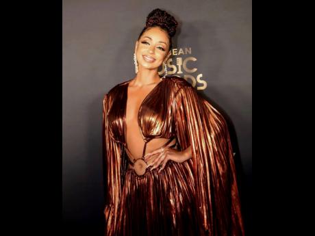 Mýa, styled by Aliecia Brissett, in Bronx and Banco.