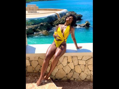 Credit: Contributed Embracing the concept of living in the present, DaCosta soaks up the sun on the northern coast of Jamaica.
