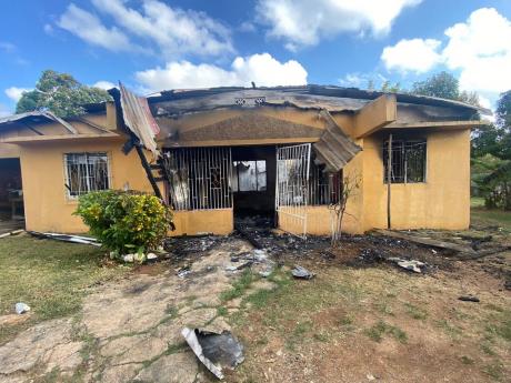 The gutted remains of the home in Toll Gate, Clarendon. 