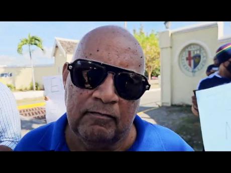 Peter Blake at the entrance of JC among other protesters on Thursday.