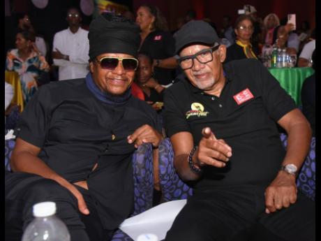 Maxi Priest, international reggae vocalist (left) shares lens with Robert Livingston, Reggae Sumfest director.